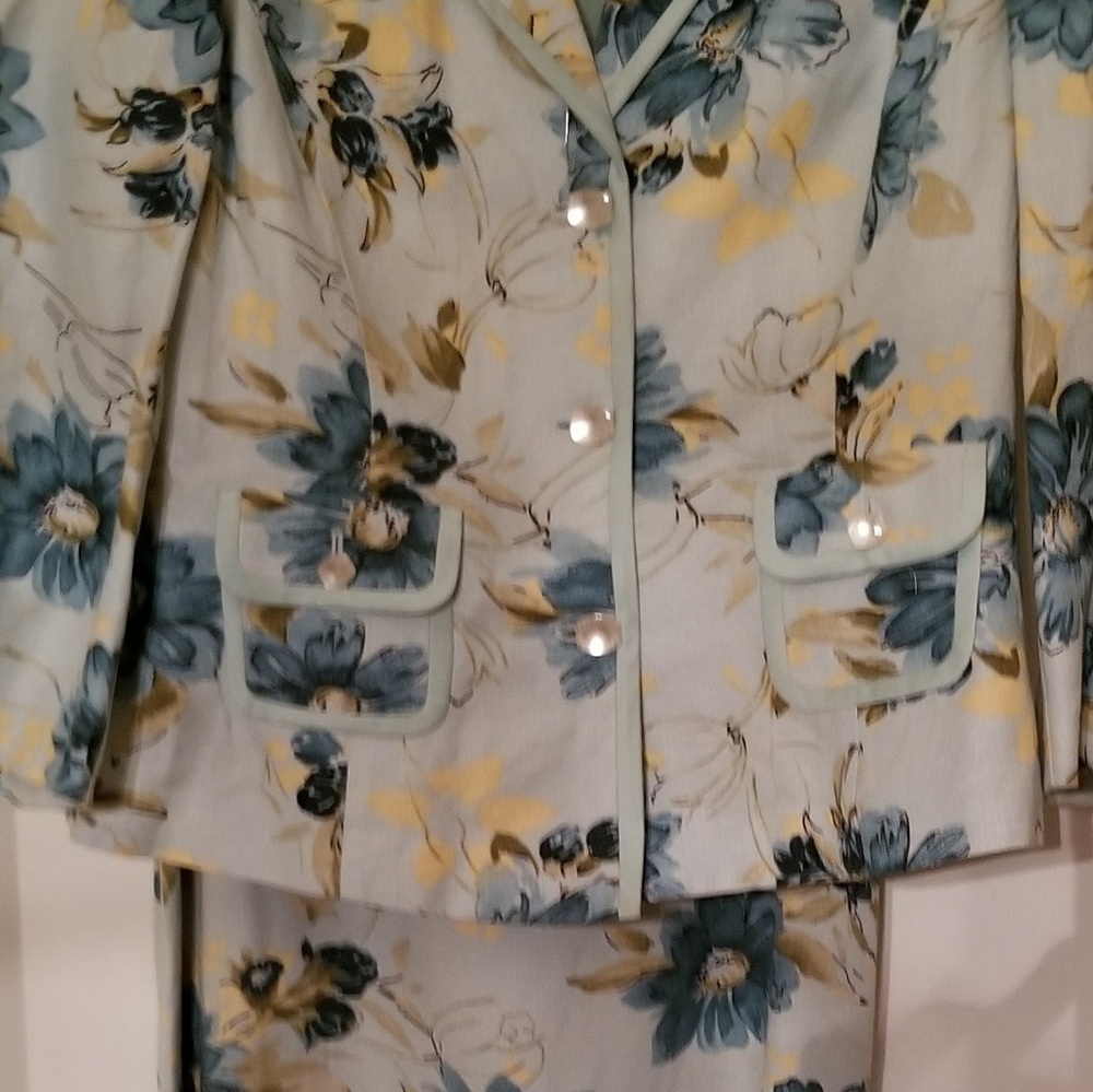 Two piece flower suit. Very good condition